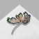 Brooch "Flower" with a pearl core, color in gold