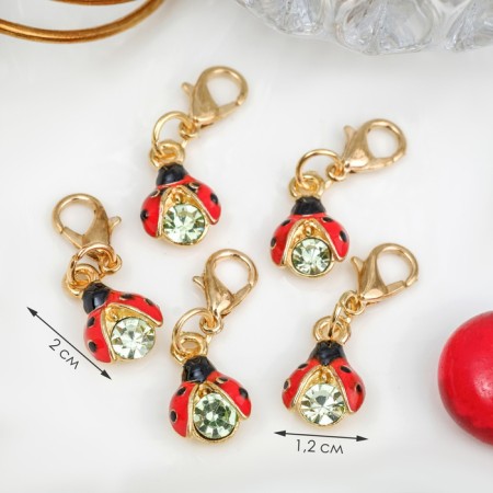 Charm "God's ladybug" of a crumb, color in gold
