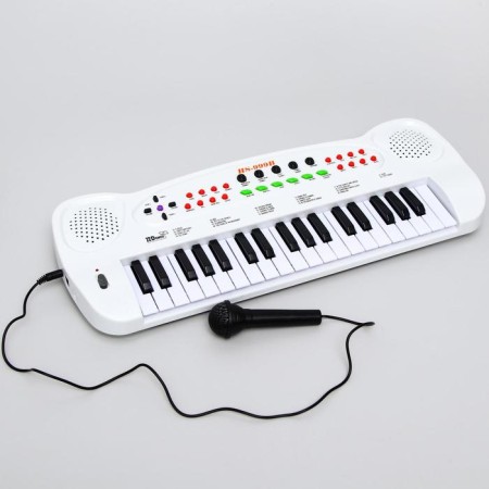 Synthesizer "Cold heart: musical adventure", works from 4 batteries like aa-1