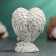 Figure "Baby sleeps in the wings" ivory, 8x5x5cm