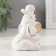 Souvenir Ceramics "Elephant with a coin - a ruble" White with gold 5.8x6.5x9.5 cm