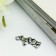 Decor for creativity Metal "Bear with chamomile" silver 2x1 cm