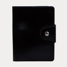 The cover on the button, for auto documents and passports, black color