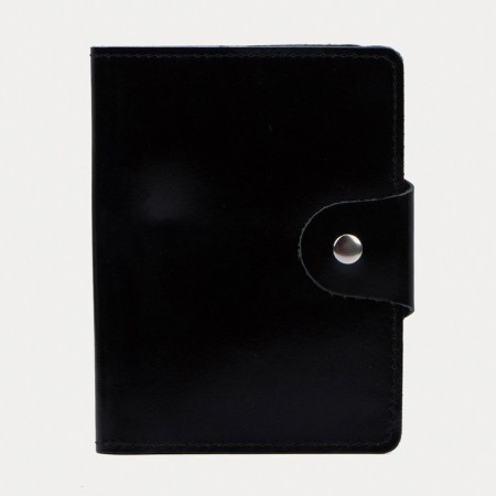 The cover on the button, for auto documents and passports, black color