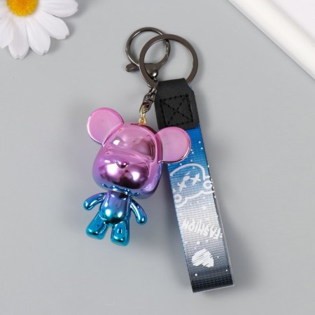A plastic keychain with a carbine, a strap "Bear" holography 4x5.3x6.5 cm-1