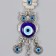 Suspension from the evil eye "Filin with flower" 16.5 cm