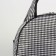 Road bag on a zipper, a suitcase holder, black/white color