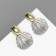 Earrings metal "shell" skirt, color gold