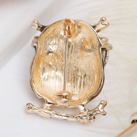 Brooch "Eagle owls", color in gold-1