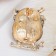 Brooch "Eagle owls", color in gold