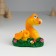 Polystone souvenir "Orange snakes with flowers on the grass" 6x5.8x8.8 cm