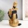 African Polystone souvenir sits with a wicker jug ​​"gold 23x13.5x10.3 cm