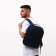 A backpack with a zipper, the color is blue