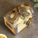 Piggy bank "chest with snakes" color