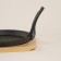 Cast iron pan on a wooden stand Sl Home, D = 22.5 cm, h = 2.5 cm, black color is black