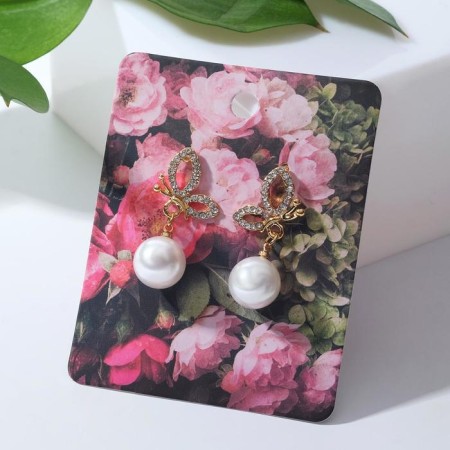 Earrings with pearls "butterfly" with bead, white color in gold-1