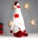 Interior doll "Santa Claus in a red overalls, in a cap with stars" 35x16x14 cm