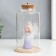 Souvenir Polystone Light "Girl in a hood with a flower and a pen" 10x10x17.5 cm