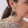 Earrings Assorted Monster Vakanda, green-brown color in gold