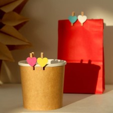 A set of clothespins in a wooden box 