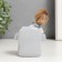 Polystone souvenir "Baby in an armchair with a book/bear" mix 10x7x7 cm