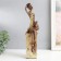 Souvenir Polystone "African with a jug, on the stand" Gold Pattern - circles 10.5x8x33.5 cm