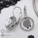 Earrings with rhinestones "Bright classic" in a frame, white color in silver, d = 1.4 cm