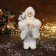 Santa Claus "in a white fur coat, with a flashlight and gifts" 30 cm