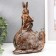 Polystone souvenir "Rabbit with a book on a snail" 20x17x8 cm