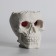 Figure candle in concrete "Crying skull", red