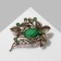 Brooch "Oliva" on a branch, green color in black bronze