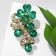 Brooch "Flower Vine", emerald color in black gold