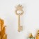 Panel interior polystone "twisted key with a crown" gold with a white patina 5.5x1x17 cm