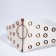 Women's belt, width 12 cm, on lightning, white color