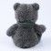 Soft toy "Little Friend", New Year's bear with a green scarf, dark gray color