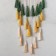 Panel wall -mounted macrame "Flower with colored brushes" 48x20 cm