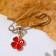 Clover-shaped pins with an eye, 3.5cm, red color in gold
