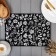 Ethel napkin Flowers Black 30x45 cm View 1, 100% PE, 370 g/m2