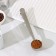 Spoon for coffee aroma, with a clamp, silver color