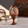 Souvenir egg on the stand icon "God's Mother of God is worthy"