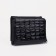 Women's wallet on the button, black color