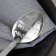 A teaspoon spoon with an “explosive character” engraving, on a gift card, 3 x 14 cm.