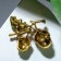 Brooch "Stoils", white-green color in black gold