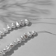 Plastic beads on the threads 