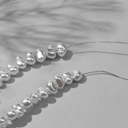Plastic beads on the threads "Pearls" 1 × 0.7 × 0.3 cm, (set of 110 beads), white color