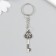 Metal keychain "Key with rhinestones" silver 1.5x1.6x4.2 cm