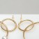 Earrings with pearls "Tenderness" Two rings with beads, white color in gold