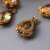 Decor for creativity plastic "drop with golden flowers" transparent crystal 2x1.2 cm