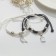 Bracelets "Demetrons" bird with a cage, black and white color, 7 cm