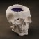 Figure candle in concrete "Crying skull", purple